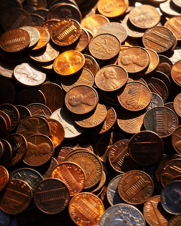 High-resolution image showcasing a pile of mixed coins representing financial concepts.